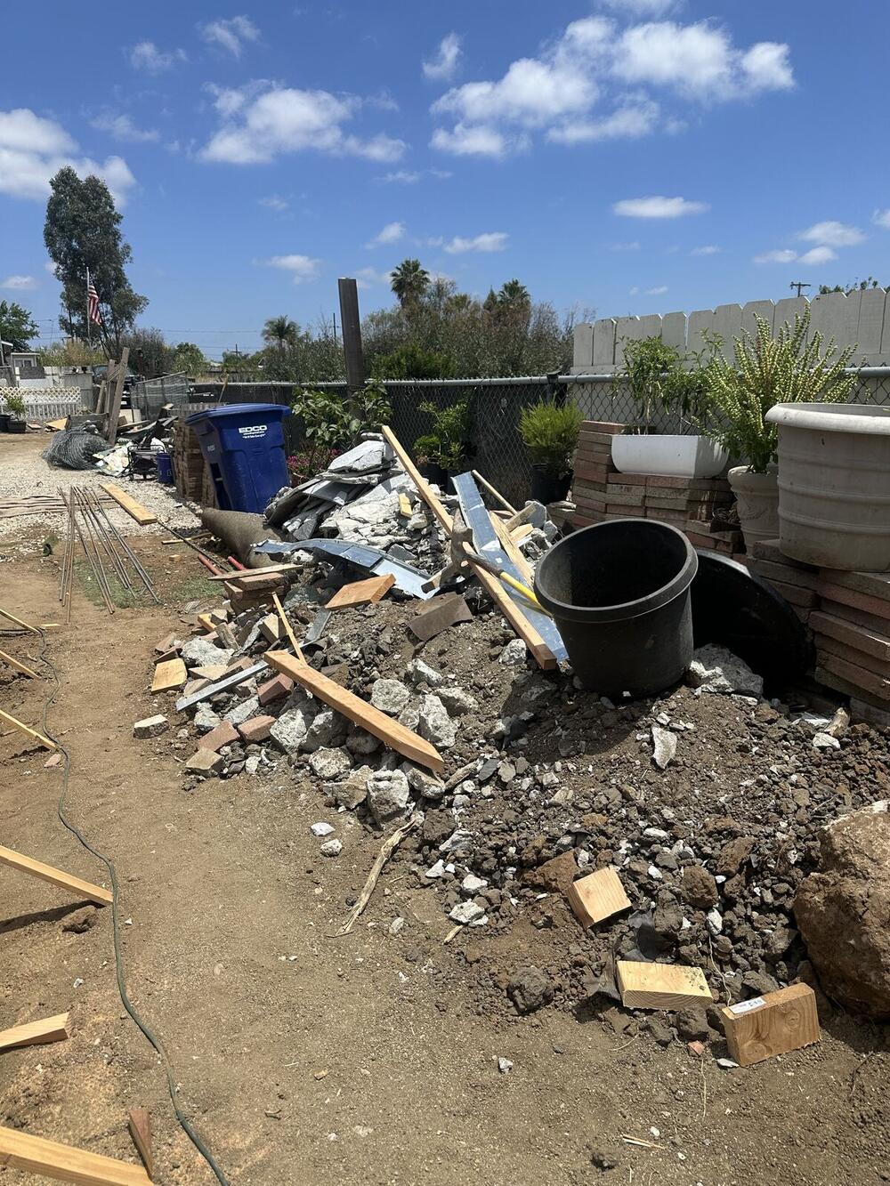 Construction and concrete debris cleared from a yard